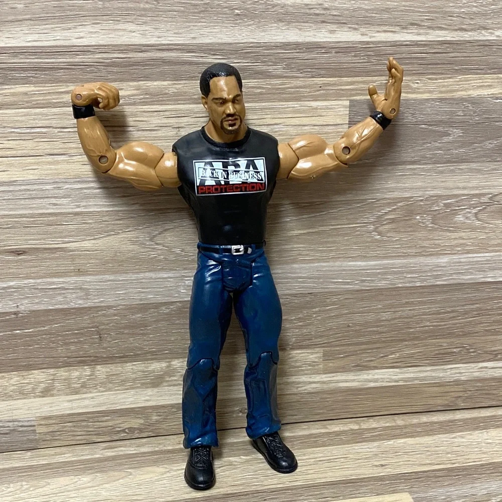 WWE Wrestling Action Figures with Black Shirts and Blue Jeans